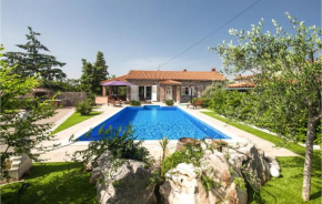 Awesome home in Dobrinj with Outdoor swimming pool, Sauna and 5 Bedrooms